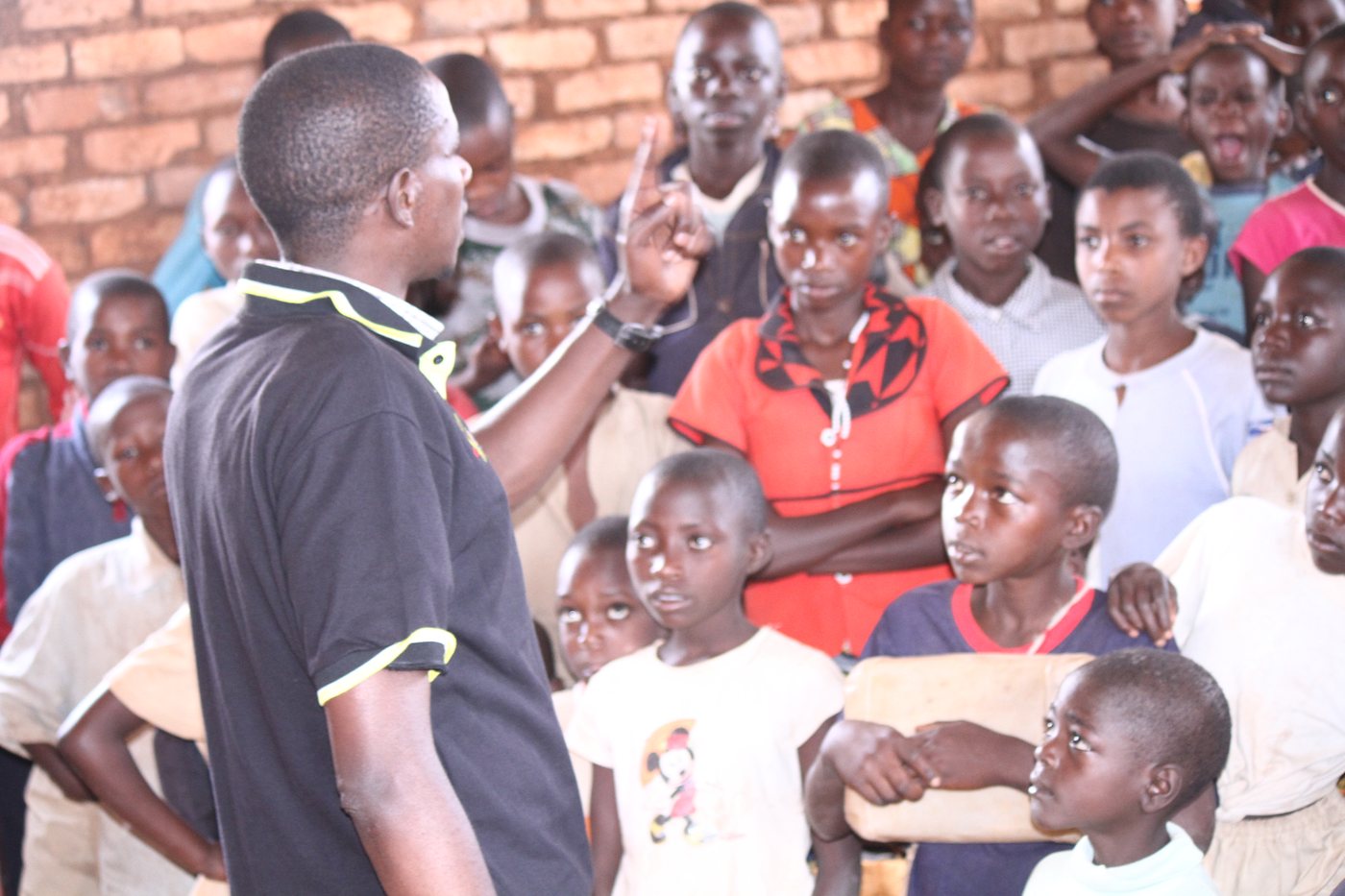A thinkSMALL team member teaching children