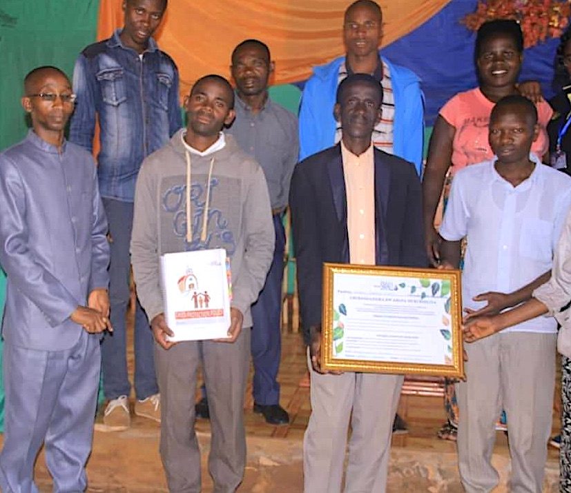 Church leaders receiving their child protection training certificate