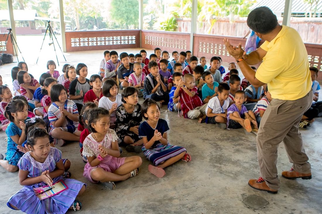 A teacher leading a children's discipleship class